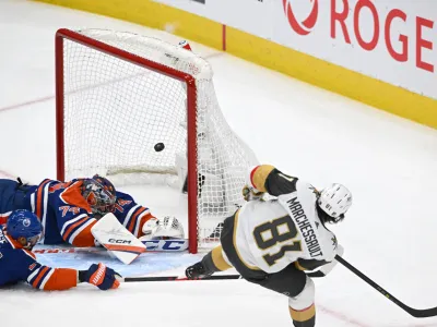 May 14, 2023; Edmonton, Alberta, CAN; Vegas Golden Knights right wing Jonathan Marchessault (81) shoots the puck as Edmonton Oilers goaltender Stuart Skinner (74) defenseman Darnell Nurse (25) attempt to block during the second period in game six of the second round of the 2023 Stanley Cup Playoffs at Rogers Place. Mandatory Credit: Walter Tychnowicz-USA TODAY Sports