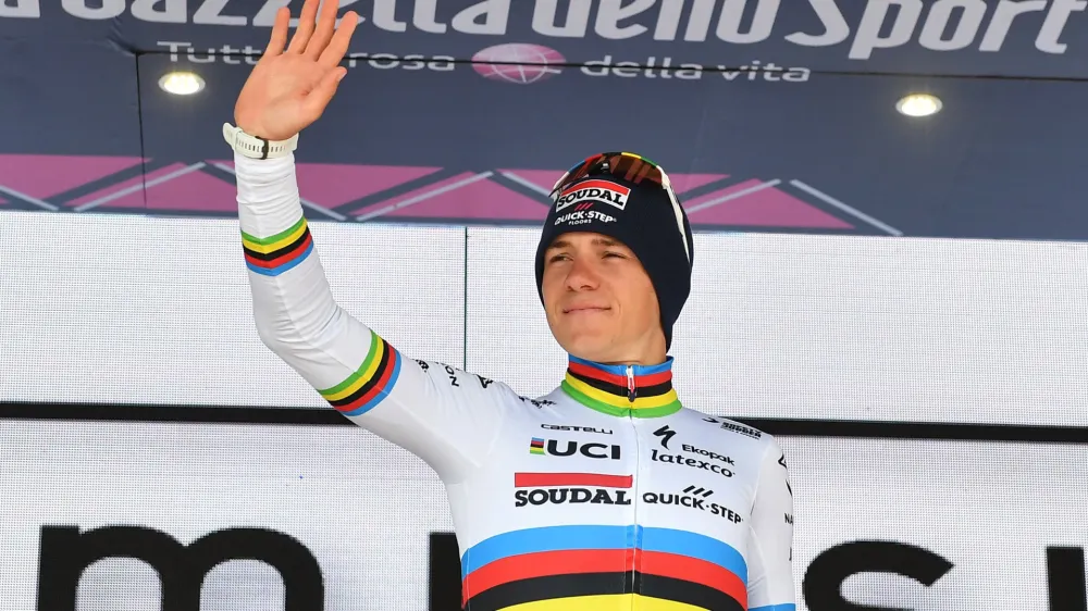 Cycling - Giro d'Italia - Stage 9 - Savignano sul Rubicone to Cesena Tudor ITT - Italy - May 14, 2023 Soudal &ndash; QuickStep's Remco Evenepoel celebrates wearing the maglia bianca jersey REUTERS/Jennifer Lorenzini