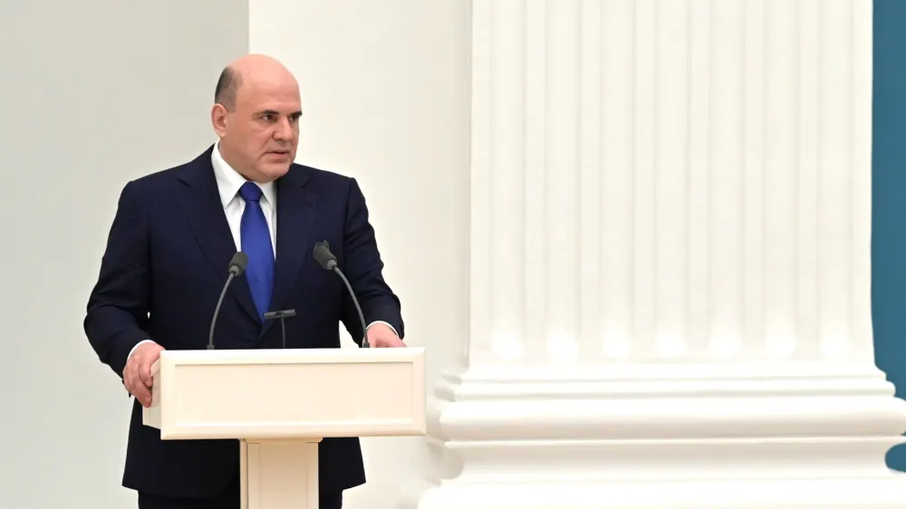 FILED - 21 February 2022, Russia, Moscow: Russian Prime Minister Mikhail Mishustin speaks during a meeting of the Russian Federation Security Council at the Kremlin. Mishustin has called for more economic cooperation at the start of a two-day visit to China. Photo: -/Kremlin/dpa - ATTENTION: editorial use only and only if the credit mentioned above is referenced in full