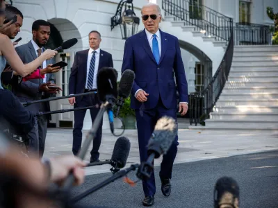 U.S. President Joe Biden speaks to the media before departing the White House for Camp David, in Washington, U.S., May 26, 2023. REUTERS/Evelyn Hockstein