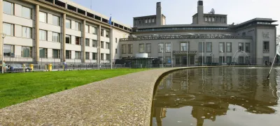 Exterior of the U.N. war crimes tribunal for former Yugoslavia in The Hague, Netherlands, Wednesday, July 30, 2008. The court has announced that former Bosnian Serb leader Radovan Karadzic will be summoned before a judge Thursday afternoon and asked to enter a plea on each of 11 counts, including genocide, extermination and persecution. (AP Photo/ Cris Toala Olivares)