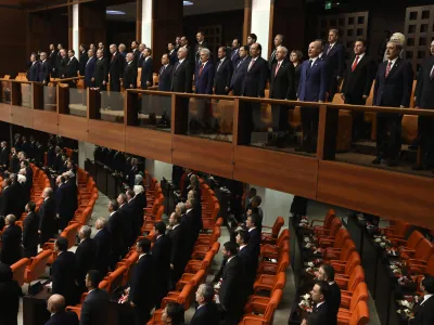 Legislators elected to the Grand National Assembly of Turkey in the May 14 parliamentary elections attend their first parliamentary session to take the oath, in Ankara, Turkey, Friday, June 2, 2023. Turkish President Recep Tayyip Erdogan's ruling Justice and Development Party and its nationalist and Islamist allies have a majority in the 600-seat parliament, having won a total of 323 seats. Erdogan, who won a runoff presidential vote on May 28, formally starts his third presidential term following a ceremony on Saturday. (AP Photo/Ali Unal)