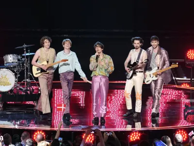 Joker Out of Slovenia performs during the second semi final at the Eurovision Song Contest in Liverpool, England, Thursday, May 11, 2023. (AP Photo/Martin Meissner)