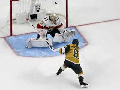 Vegas Golden Knights right wing Jonathan Marchessault (81) scores a goal on Florida Panthers goaltender Alex Lyon (34) during the third period of Game 2 of the NHL hockey Stanley Cup Finals, Monday, June 5, 2023, in Las Vegas. The Golden Knights defeated the Panthers 7-2 to take a 2-0 series lead. (AP Photo/John Locher)