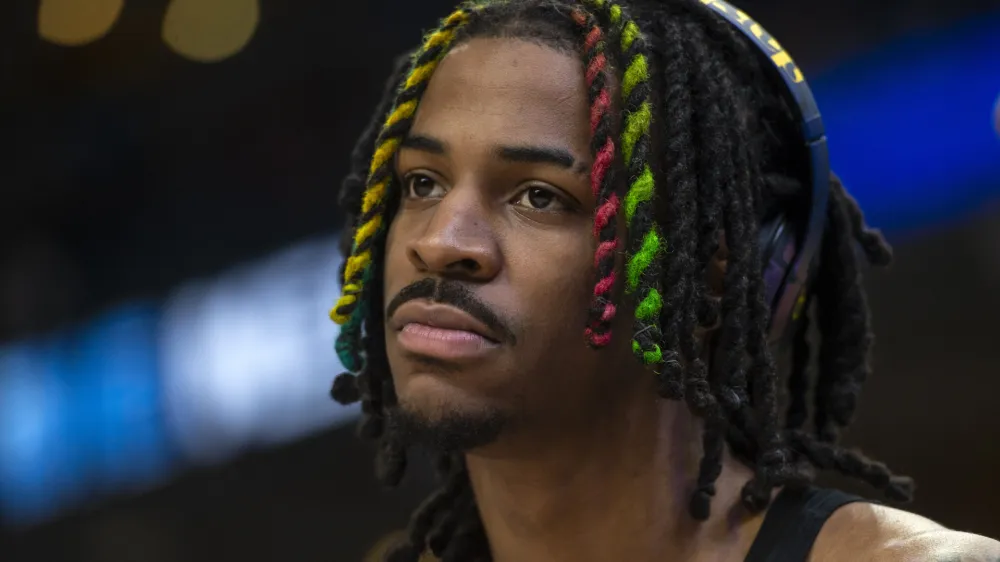 FILE - Memphis Grizzlies guard Ja Morant warms up before an NBA basketball game against the Houston Rockets, Wednesday, March 22, 2023, in Memphis, Tenn. Morant has been suspended for the first 25 games of the upcoming season for his second known incident of displaying what appeared to be a firearm on social media, the NBA announced Friday, June 16, 2023. (AP Photo/Brandon Dill, File)