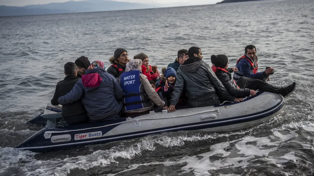 FILED - 28 February 2020, Greece, Lesbos: Refugees in a lifeboat arrive on the Greek island of Lesbos after crossing the Aegean Sea with other migrants from Turkey. A passing freighter rescued 68 migrants whose boat was in distress off the Greek island of Kalymnos on Monday morning, Greek media reported. Photo: Angelos Tzortzinis/dpa