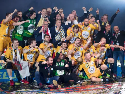 In this Sunday, May 29, 2016 photo the team of Kielce celebrate after winning the Handball Champions League EHF Final Four final between KS Vive Kielce and MKB Veszprem in Cologen, western Germany. (Marius Becker/dpa via AP)
