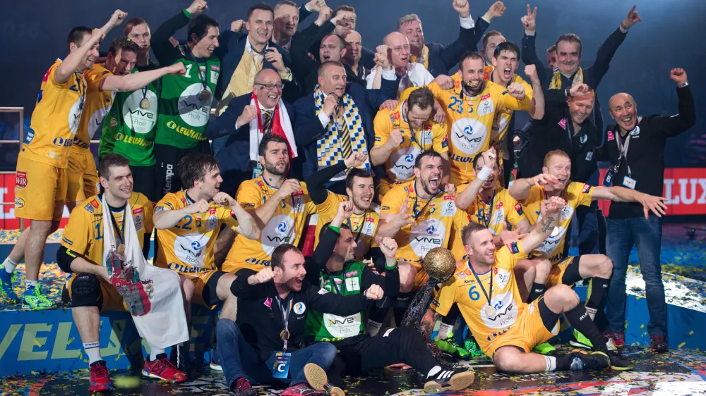 In this Sunday, May 29, 2016 photo the team of Kielce celebrate after winning the Handball Champions League EHF Final Four final between KS Vive Kielce and MKB Veszprem in Cologen, western Germany. (Marius Becker/dpa via AP)