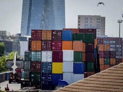 FILE - Containers are piled up at the cargo container terminal in Frankfurt, Germany, on May 31, 2023. The German economy appears to have returned to slight growth in the April-June period after shrinking for two consecutive quarters, the country's central bank said Monday July 17, 2023. (AP Photo/Michael Probst, File)