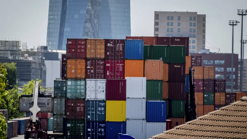 FILE - Containers are piled up at the cargo container terminal in Frankfurt, Germany, on May 31, 2023. The German economy appears to have returned to slight growth in the April-June period after shrinking for two consecutive quarters, the country's central bank said Monday July 17, 2023. (AP Photo/Michael Probst, File)