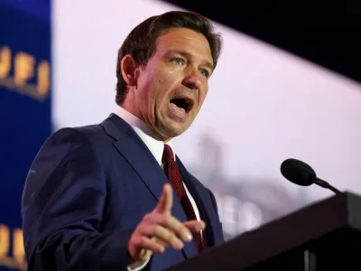 FILE PHOTO: Republican presidential candidate, Florida Governor Ron DeSantis, delivers remarks at the annual Christians United for Israel Summit (CUFI), at the Crystal Gateway Marriott in Arlington, Virginia, U.S., July 17, 2023. REUTERS/Kevin Wurm/File Photo