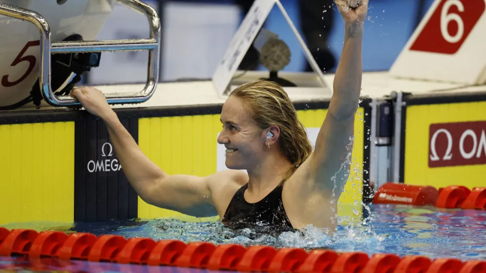 Fukuoka 2023 World Aquatics Championships - Swimming - Marine Messe Fukuoka Hall A, Fukuoka, Japan - July 23, 2023 Australia's Ariarne Titmus celebrates after winning the women's 400m freestyle final REUTERS/Issei Kato