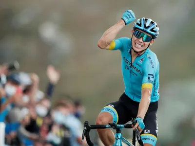 FILE PHOTO: Cycling - Tour de France - Stage 17 - Grenoble to Meribel Col De La Loze - France - September 16, 2020. Astana Pro Team rider Miguel Angel Lopez of Colombia crosses the finish line REUTERS/Benoit Tessier/File Photo