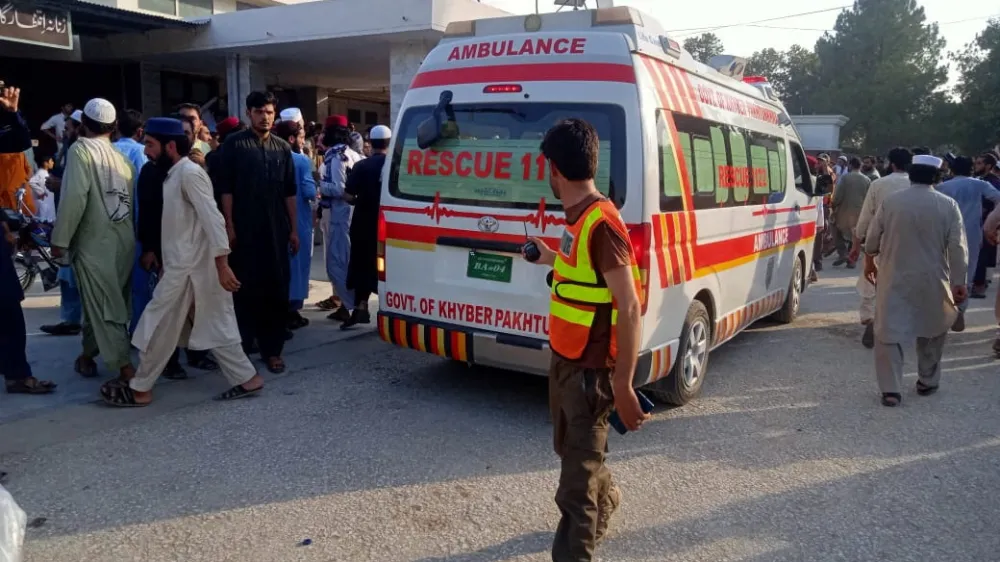 An ambulance carries the injured to the hospital, after a blast in Bajaur district of Khyber Pakhtunkhwa province, Pakistan July 30, 2023. Rescue 1122/Handout via REUTERS ATTENTION EDITORS - THIS IMAGE HAS BEEN SUPPLIED BY A THIRD PARTY. MANDATORY CREDIT. NO RESALES. NO ARCHIVE.