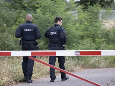 FILED - 21 July 2023, Hesse, Frankfurt/Main: Police officers patrol around Frankfurt Airport. Photo: Boris Roessler/dpa