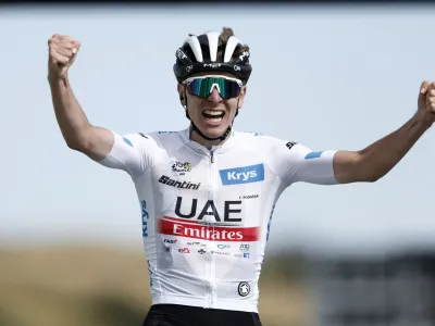Cycling - Tour de France - Stage 20 - Belfort to Le Markstein Fellering - France - July 22, 2023 UAE Team Emirates' Tadej Pogacar celebrates as he crosses the finish line to win stage 20 REUTERS/Benoit Tessier