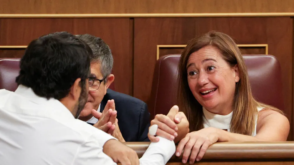 Francina Armengol, of Spanish Socialist Workers' Party (PSOE), is greeted following her election as speaker during a parliament session, as Spain's new parliament is constituted, following an inconclusive snap election on July 23, opening the race for PM nomination, at the Spanish parliament, in Madrid, Spain, August 17, 2023. REUTERS/Violeta Santos Moura