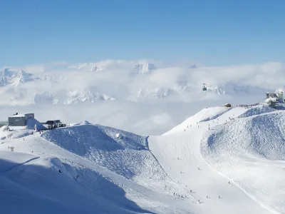 Cable car station on the top of swiss mountains with mont blanc on the background