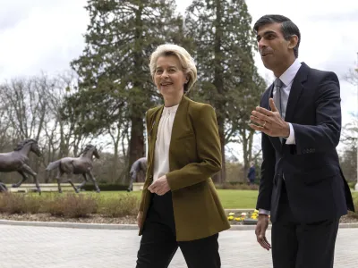 Britain's Prime Minister Rishi Sunak, right, greets European Commission President Ursula von der Leyen at the Fairmont Hotel in Windsor, England, Monday Feb. 27, 2023. The U.K. and the European Union were poised Monday to end years of wrangling and seal a deal to resolve their thorny post-Brexit trade dispute over Northern Ireland. Striking an agreement at a meeting with European Commission President Ursula von der Leyen would be a big victory for Prime Minister Rishi Sunak &mdash; but not the end of his troubles. (Dan Kitwood/Pool via AP)