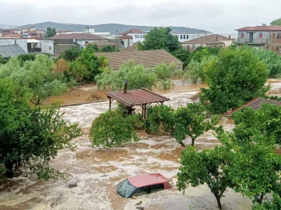 A car is submerged under water during a storm on mount Pelion, near Volos, Greece, September 5, 2023. Thanassis Kalliaras/Eurokinissi via REUTERS ATTENTION EDITORS - THIS PICTURE WAS PROVIDED BY A THIRD PARTY. NO RESALES. NO ARCHIVES. NO EDITORIAL SALES IN GREECE. GREECE OUT.
