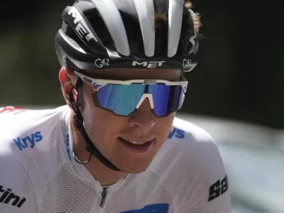 Slovenia's Tadej Pogacar, wearing the best young rider's white jersey, rides during the twentieth stage of the Tour de France cycling race over 133.5 kilometers (83 miles) with start in Belfort and finish in Le Markstein Fellering, France, Saturday, July 22, 2023. (AP Photo/Thibault Camus)