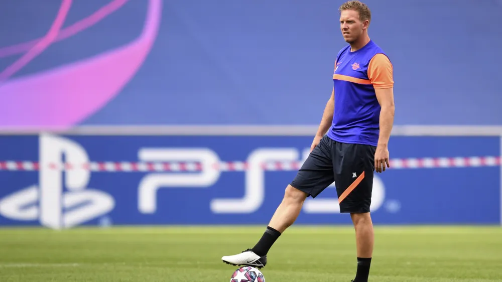 Leipzig's head coach Julian Nagelsmann directs a training session at the Luz stadium in Lisbon, Monday Aug. 17, 2020. Leipzig will play PSG in a Champions League semifinals soccer match on Tuesday. (David Ramos/Pool via AP)