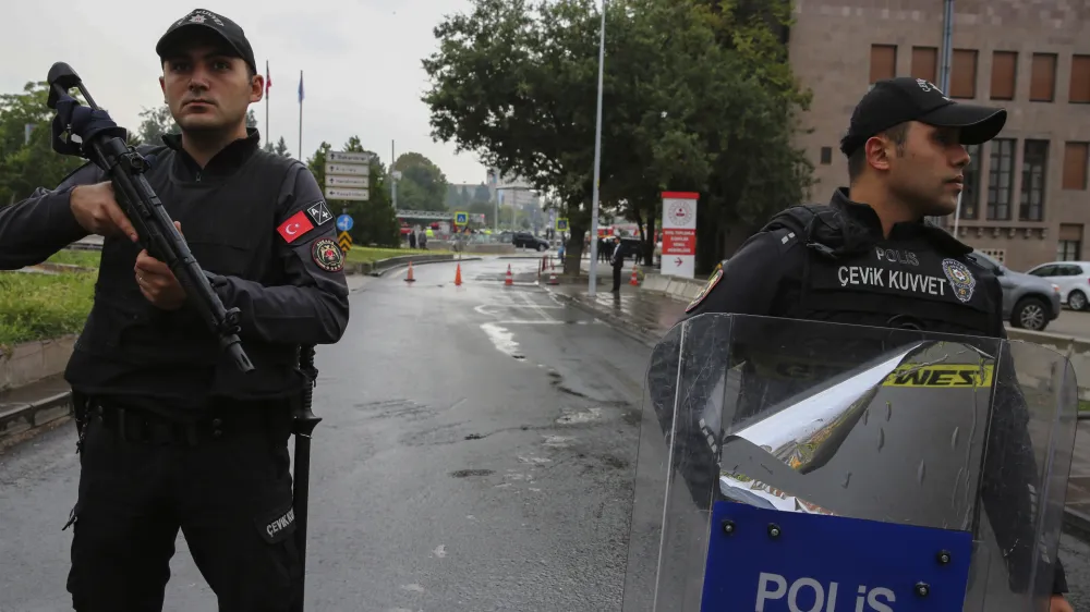 Turkish security forces cordon off an area after an explosion in Ankara, Sunday, Oct. 1, 2023. A suicide bomber detonated an explosive device in the heart of the Turkish capital, Ankara, on Sunday, hours before parliament was scheduled to reopen after a summer recess. A second assailant was killed in a shootout with police. (AP Photo/Ali Unal)
