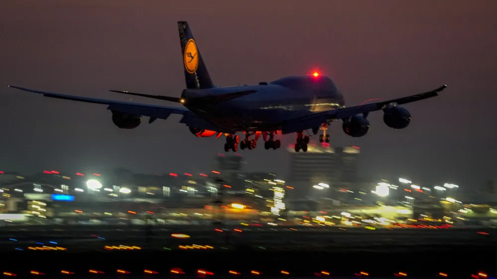 FILE --A Lufthansa Boeing 747 aircraft approaches the international airport in Frankfurt, Germany, early Friday, Aug. 13, 2021. A German union has called on Lufthansa ground staff to walk out on a one-day strike Wednesday in a dispute over pay.<br>(AP Photo/Michael Probst),file)