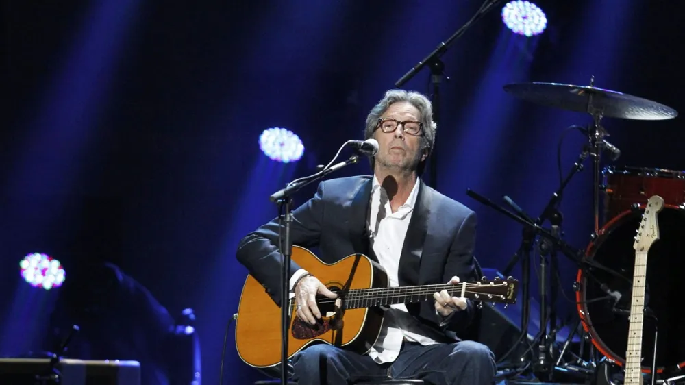 70 let<br>Legendarni glasbenik Eric Patrick Clapton<br>Perfekcionist in &scaron;e več<br>Na kitari je igral tako, da so ga že pri 21-tih imenovali Bog <br>