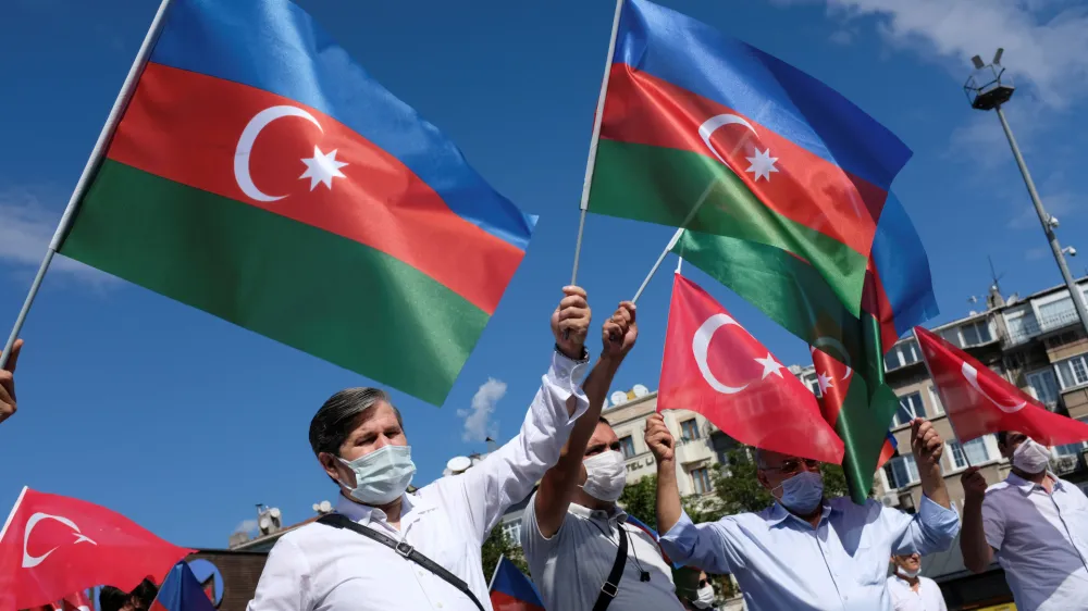 Demonstrators wave flags of Azerbaijan and Turkey during a protest against Armenia in Istanbul, Turkey October 1, 2020. REUTERS/Murad Sezer