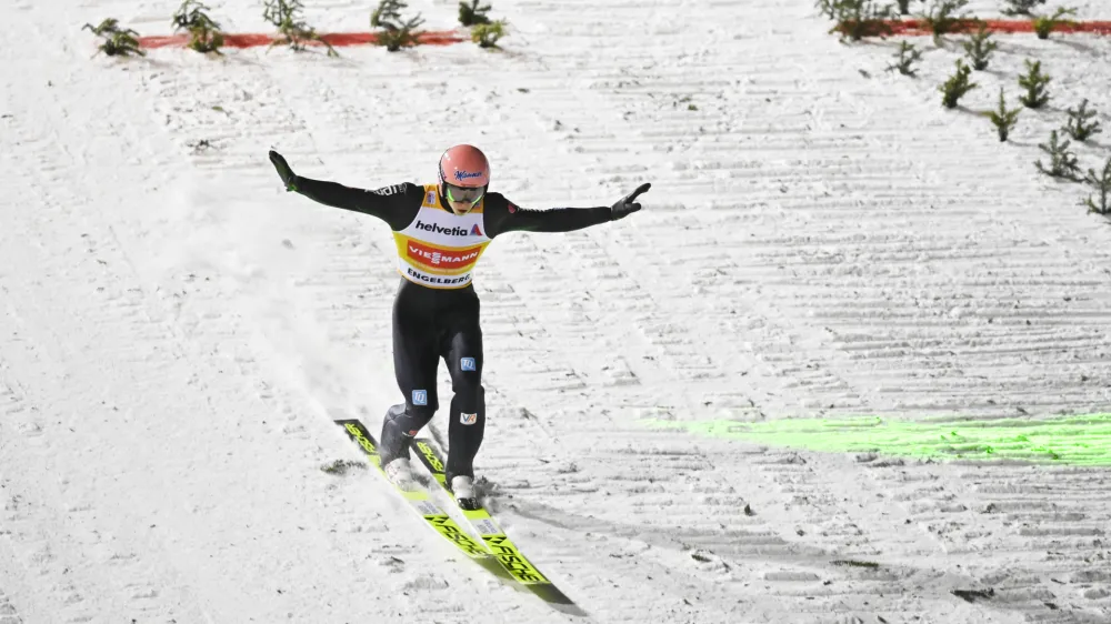 Karl Geiger of Germany in action, during the men's ski jumping FIS World Cup at the Titlisschanze, in Engelberg, Switzerland, Sunday, Dec. 19, 2021. (Gian Ehrenzeller/Keystone via AP)