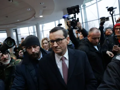 Former Polish Prime Minister Mateusz Morawiecki attends gathering of protesters and Law and Justice politicians after the management of Polish public television, radio and news agency PAP have been dismissed by the culture minister, at the broadcaster's headquarters in Warsaw, Poland, December 20, 2023. Dawid Zuchowicz/Agencja Wyborcza.pl via REUTERS ATTENTION EDITORS - THIS IMAGE WAS PROVIDED BY A THIRD PARTY. POLAND OUT. NO COMMERCIAL OR EDITORIAL SALES IN POLAND.