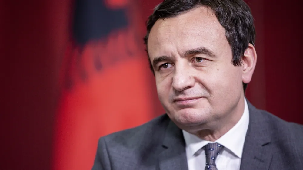 FILE - In this Sunday, Feb. 14, 2021 file photo, Albin Kurti leader of Vetevendosje (Self-Determination) speaks during an interview with The Associated Press in capital Pristina, Kosovo. Kosovo&acirc;&euro;&trade;s newly-elected parliament has approved the new government challenged by the management of the virus pandemic following recent surging numbers. In an extraordinary session after the first one held earlier Monday, March 22, 2021 the parliament voted 67 in favor and 30 against the new Cabinet presented by Prime Minister Albin Kurti. (AP Photo/ Visar Kryeziu, file)