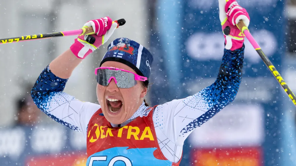 Kerttu Niskanen of Finland, the winner, reacts in the finish area after the women's 10 km classic race at the FIS Tour de Ski in Lenzerheide, Switzerland, Wednesday, Dec. 29, 2021. (Peter Schneider/Keystone via AP)