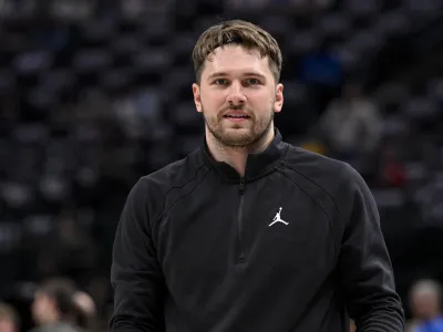 Jan 3, 2024; Dallas, Texas, USA; Dallas Mavericks guard Luka Doncic (77) warms up before the game between the Dallas Mavericks and the Portland Trail Blazers at the American Airlines Center. Mandatory Credit: Jerome Miron-USA TODAY Sports