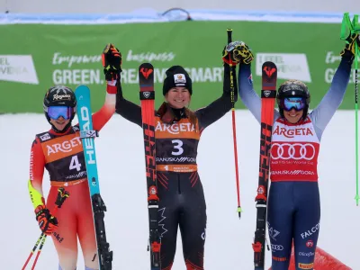 Alpine Skiing - FIS Alpine Ski World Cup - Women's Giant Slalom - Kranjska Gora, Slovenia - January 6, 2024 Canada's Valerie Grenier celebrates after winning the Women's Giant Slalom alongside second placed Switzerland's Lara Gut-Behrami and third placed Italy's Federica Brignone REUTERS/Borut Zivulovic
