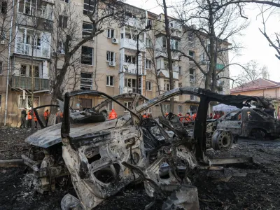 A view shows destroyed cars and an apartment building damaged during a Russian drone strike, amid Russia's attack on Ukraine, in Odesa, Ukraine January 17, 2024. REUTERS/Stringer