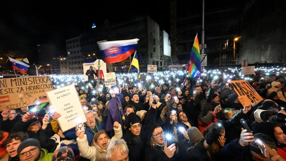 Demonstrators attend a protest against the government's proposal to cancel a branch of prosecution which the opposition says will let serious economic crimes remain unpunished and protect government figures, in Bratislava, Slovakia, January 25, 2024. REUTERS/Radovan Stoklasa