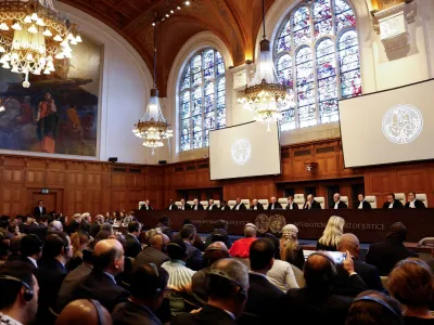 Judges at the International Court of Justice (ICJ) rule on emergency measures against Israel following accusations by South Africa that the Israeli military operation in Gaza is a state-led genocide, in The Hague, Netherlands, January 26, 2024. REUTERS/Piroschka van de Wouw