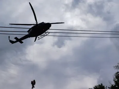 Gorska re&scaron;evalna zveza Slovenije GRZS gore re&scaron;evanje helikopter pohodniki Alpe