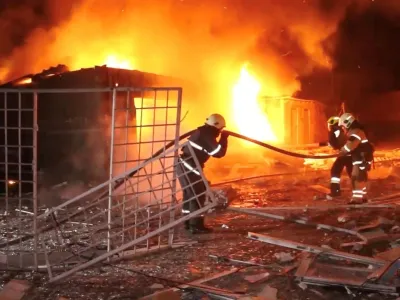 Emergency personnel work to put out a fire following a drone attack, amid Russia's attack on Ukraine, in Kharkiv, Ukraine in this screengrab obtained from a video released on January 31, 2024. State Emergency Service of Ukraine/Handout via REUTERS  THIS IMAGE HAS BEEN SUPPLIED BY A THIRD PARTY. NO RESALES. NO ARCHIVES. MANDATORY CREDIT.