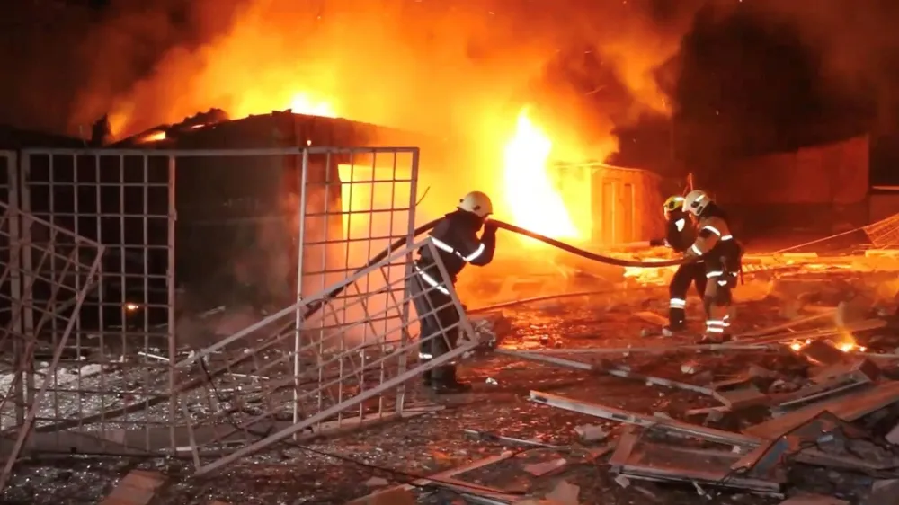 Emergency personnel work to put out a fire following a drone attack, amid Russia's attack on Ukraine, in Kharkiv, Ukraine in this screengrab obtained from a video released on January 31, 2024. State Emergency Service of Ukraine/Handout via REUTERS  THIS IMAGE HAS BEEN SUPPLIED BY A THIRD PARTY. NO RESALES. NO ARCHIVES. MANDATORY CREDIT.