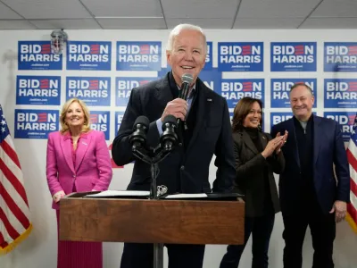 U.S. President Joe Biden speaks next to first lady Jill Biden, Vice President Kamala Harris and second gentleman Doug Emhoff during the opening of the Biden for President campaign office in Wilmington, Delaware, U.S., February 3, 2024. REUTERS/Joshua Roberts