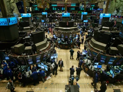 NEW YORK - FEBRUARY 20: Traders work on the floor of the New York Stock Exchange during afternoon trading February 20, 2009 in New York City. The Dow closed down 100 points to 7365.67 in a week that saw the Dow lose 6.1 percent. (Photo by Mario Tama/Getty Images)