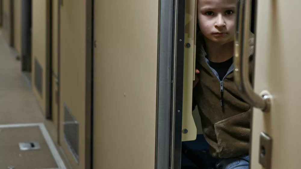 LVIV, UKRAINE - FEBRUARY 14, 2024 - A boy looks out of a compartment on the Train to Your retro train launched by Ukrainian Railways (Ukrzaliznytsia) to celebrate Valentine?s Day, Lviv, western Ukraine. (Photo by Anastasiia Smolienko/Ukrinform/Sipa USA)No Use Germany.