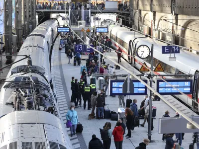 "Stay train" is written on display boards at Hamburg Central Station after long-distance traffic in northern Germany came to a standstill in Hamburg, Germany, Saturday, Oct.8, 2022. According to Deutsche Bahn, a technical malfunction is currently causing a complete standstill in long-distance traffic in northern Germany. All ICE as well as IC and EC trains in northern Germany are affected, Deutsche Bahn announced on Saturday morning. (Bodo Marks/dpa via AP)