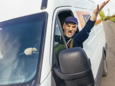 Angry driver shouting in his vehicle