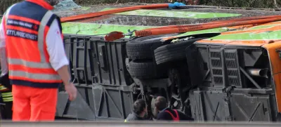 Emergency staff talk at the scene after several people were killed and more injured in a coach crash on the A9 motorway off Schkeuditz, near the eastern German city of Leipzig, Germany, March 27, 2024.  REUTERS/Marvin Matzulla/Mitteldeutsche Zeitung