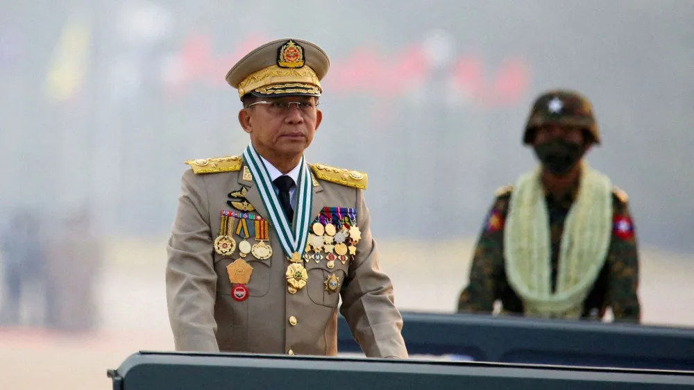 FILE PHOTO: Myanmar's junta chief Senior General Min Aung Hlaing, who ousted the elected government in a coup on February 1, 2021, presides over an army parade on Armed Forces Day in Naypyitaw, Myanmar, March 27, 2021. REUTERS/Stringer/File Photo