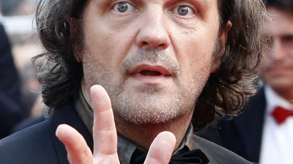 Serbian director Emir Kusturica arrives for gala screening of his film "Promise Me This" at the 60th Cannes Film Festival May 26, 2007.   REUTERS/Victor Tonelli (FRANCE)